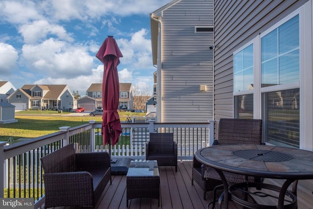 wooden deck featuring outdoor lounge area