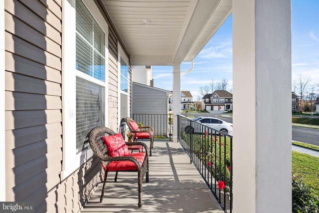 balcony featuring a porch