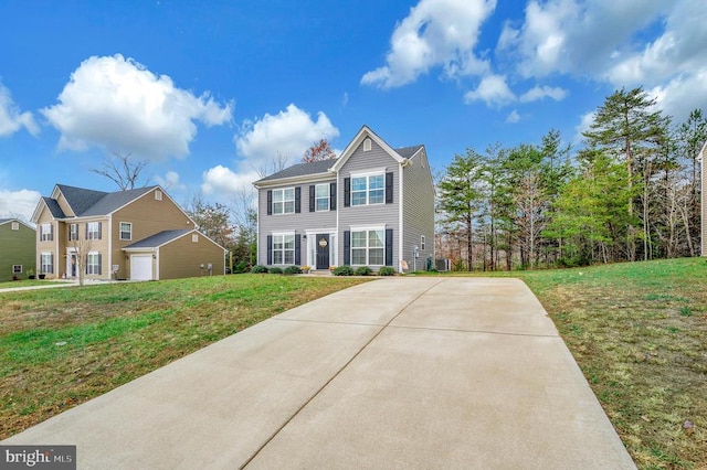 view of front of property featuring cooling unit and a front lawn