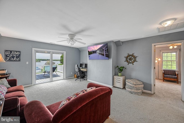 living room featuring ceiling fan and light colored carpet