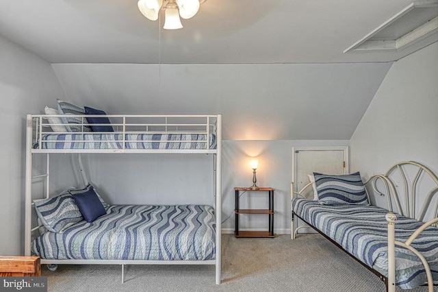 bedroom with carpet flooring, ceiling fan, and lofted ceiling