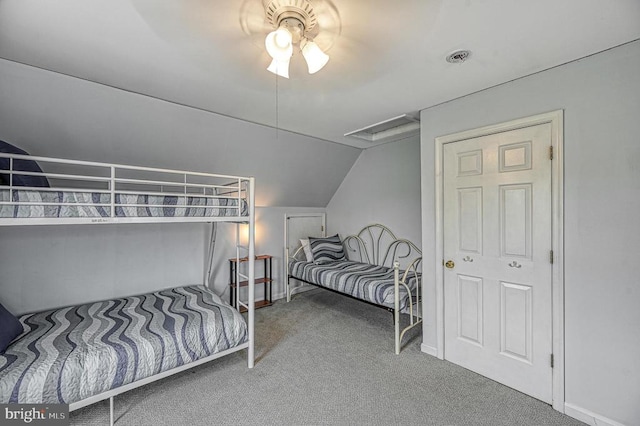 bedroom featuring ceiling fan, carpet floors, and lofted ceiling