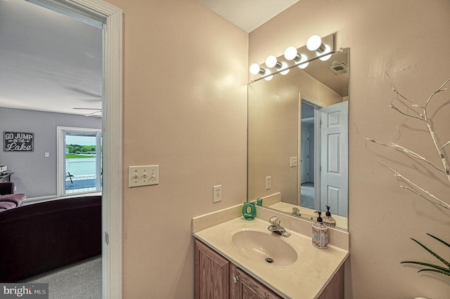 bathroom with vanity and ceiling fan