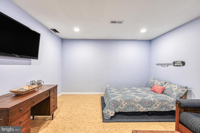 bedroom with light wood-type flooring