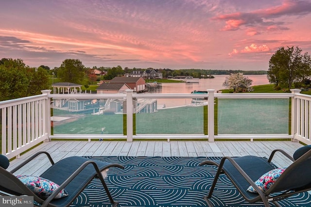 pool at dusk with a water view