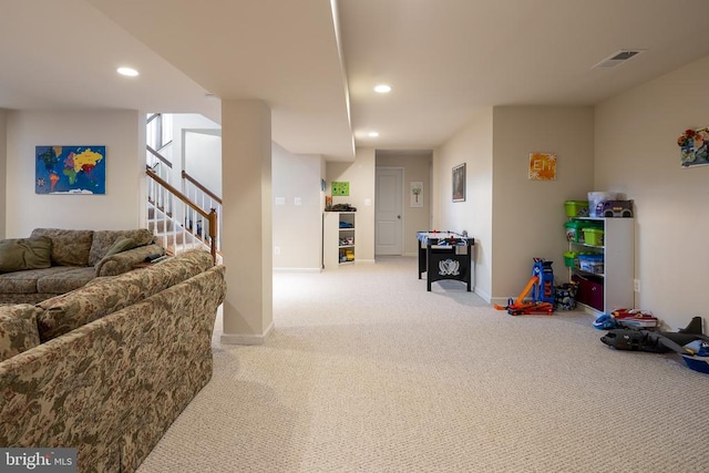 game room with light carpet