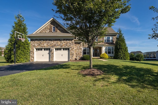 view of front facade featuring a garage and a front lawn