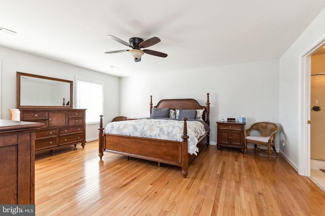 bedroom featuring ceiling fan and light hardwood / wood-style floors