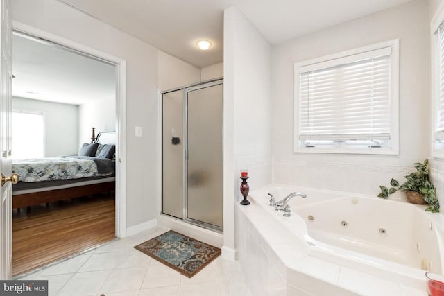 bathroom featuring shower with separate bathtub and tile patterned floors