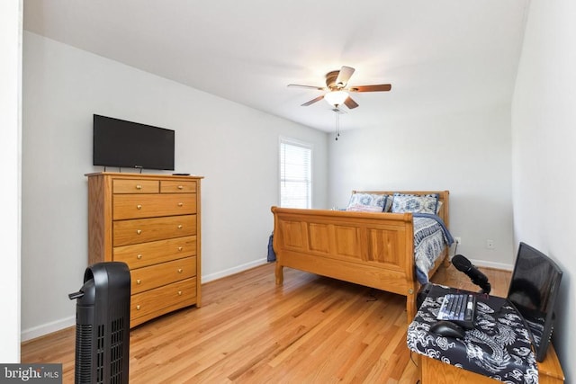 bedroom featuring ceiling fan and light hardwood / wood-style flooring