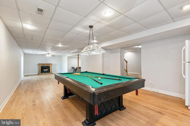 playroom featuring a drop ceiling, hardwood / wood-style flooring, and pool table