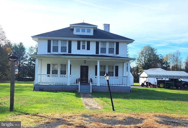 view of front of property featuring a carport, covered porch, and a front yard