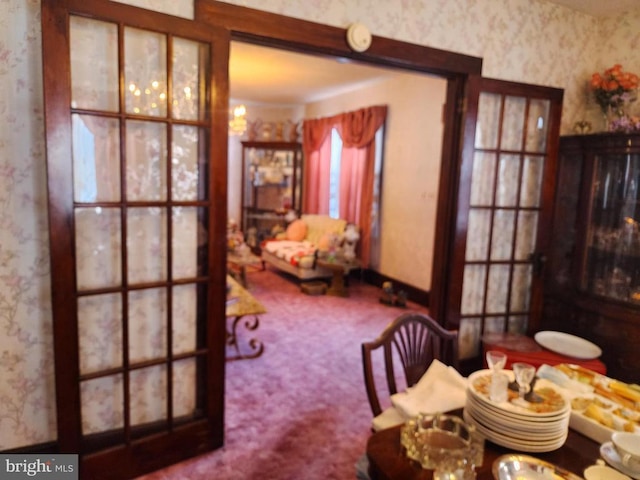 view of carpeted dining area