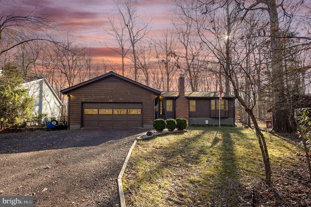 ranch-style home with a garage