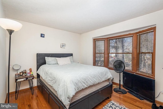 bedroom featuring hardwood / wood-style floors