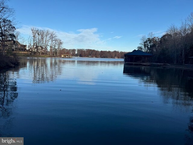 property view of water with a gazebo