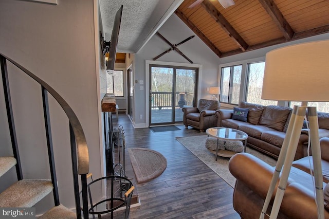 living room featuring high vaulted ceiling, dark hardwood / wood-style floors, ceiling fan, beamed ceiling, and wood ceiling