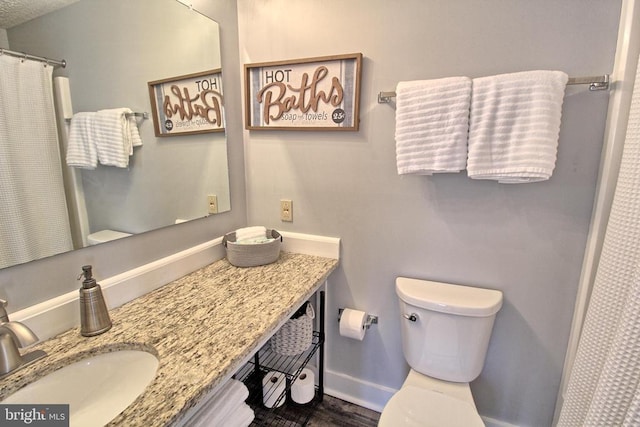 bathroom featuring vanity and wood-type flooring