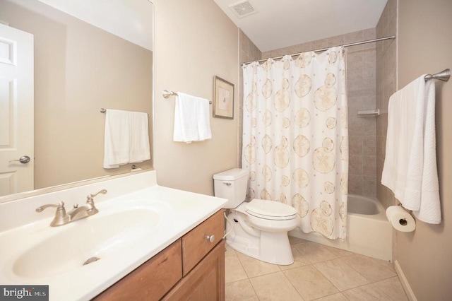 full bathroom with tile patterned floors, shower / tub combo with curtain, vanity, and toilet