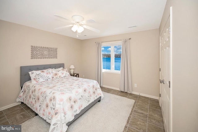 bedroom featuring ceiling fan