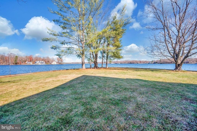 view of yard with a water view