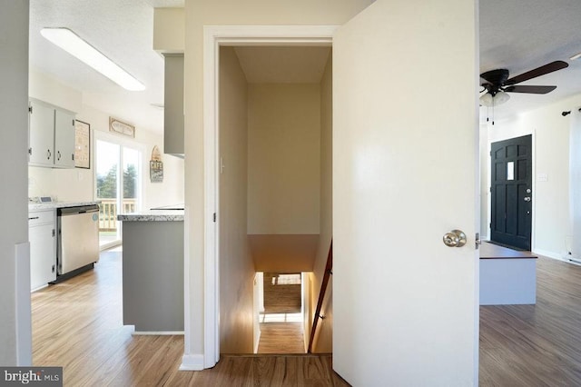 hallway with light wood-type flooring