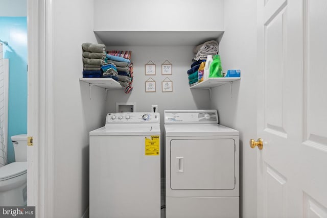 laundry area featuring separate washer and dryer