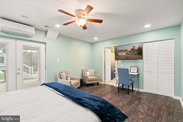 bedroom featuring a wall mounted air conditioner, french doors, hardwood / wood-style flooring, ceiling fan, and access to exterior