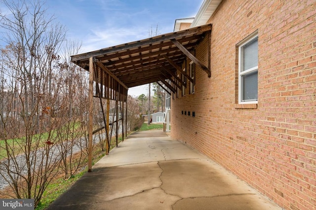 view of property exterior with a carport