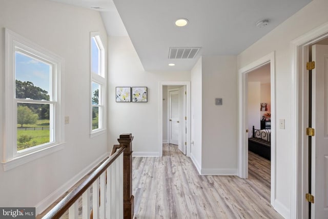 hallway featuring light hardwood / wood-style flooring