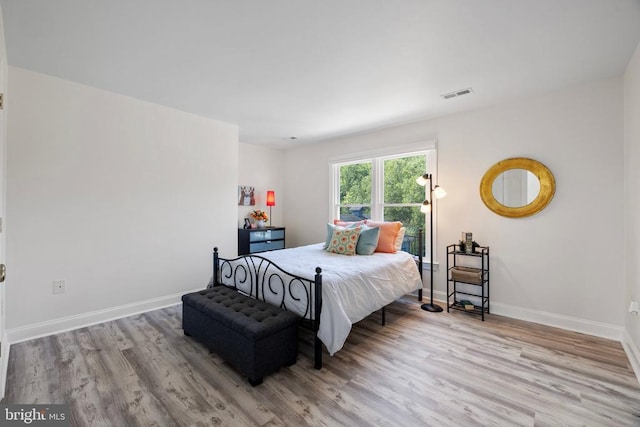 bedroom featuring light hardwood / wood-style flooring