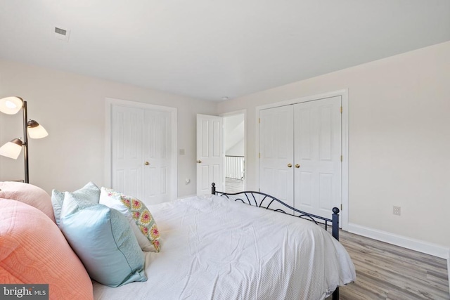 bedroom with wood-type flooring