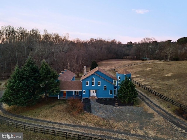 aerial view at dusk with a rural view