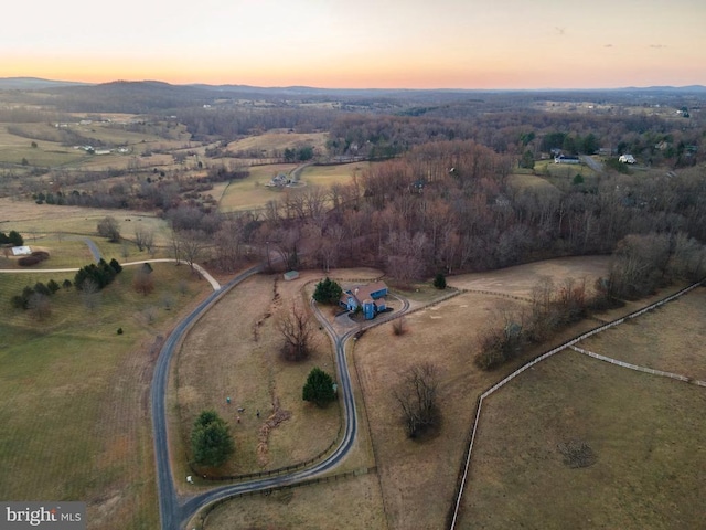 aerial view at dusk with a rural view