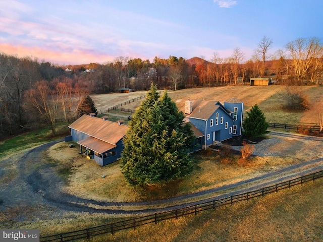 aerial view at dusk with a rural view