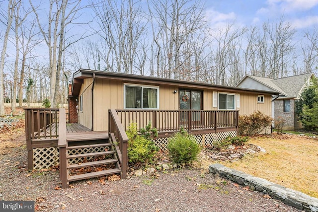 ranch-style home with a deck