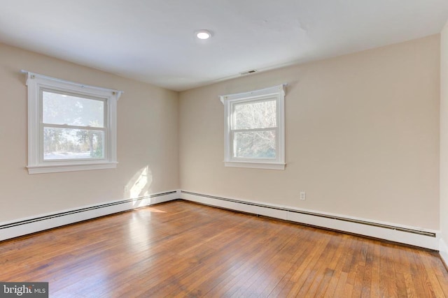 unfurnished room featuring light wood-type flooring