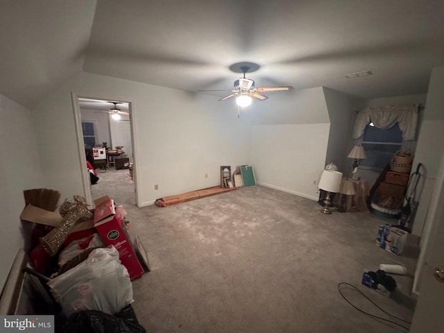 additional living space with carpet and vaulted ceiling