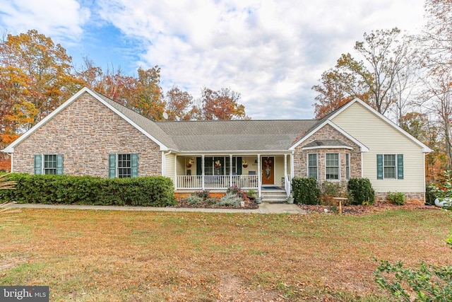 single story home featuring a front yard and a porch