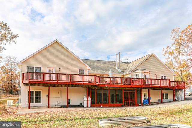 rear view of property with a deck