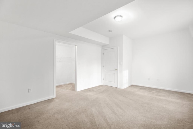 additional living space with light carpet