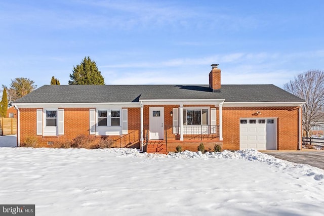 ranch-style house featuring a garage