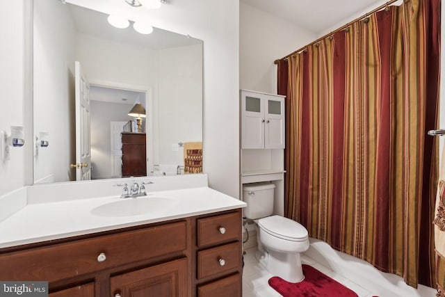 full bathroom with tile patterned floors, vanity, toilet, and shower / bath combo