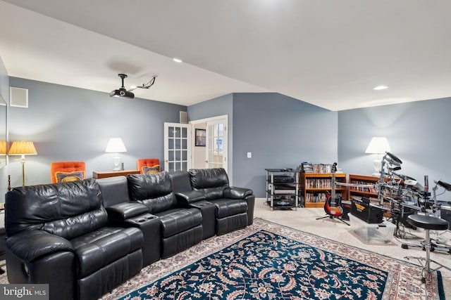 cinema featuring carpet flooring and french doors