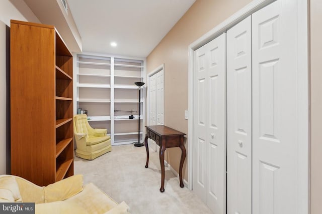 interior space with light colored carpet