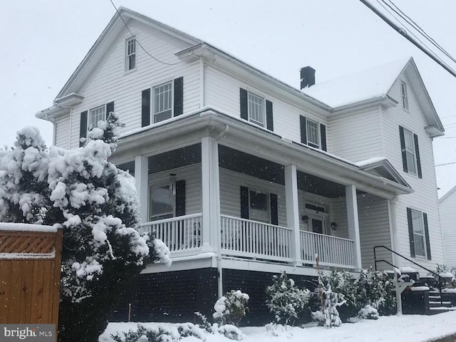 farmhouse-style home with a porch