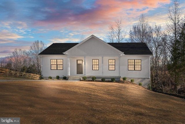 modern farmhouse style home with covered porch