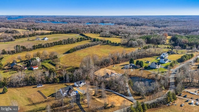 birds eye view of property featuring a rural view