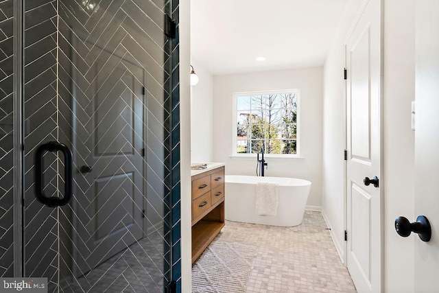 bathroom featuring tile patterned flooring, vanity, and plus walk in shower