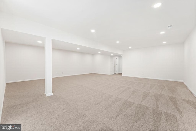 basement with light carpet